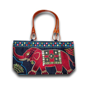 Bag embellished with mirror work