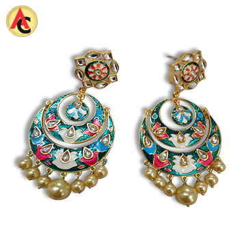 Earrings made of metal, clay and beads