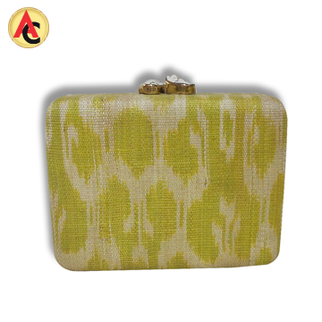 Natural fiber clutch bag with snakeskin pattern
