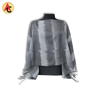 Poncho made of tied-and-dyed cotton yarn