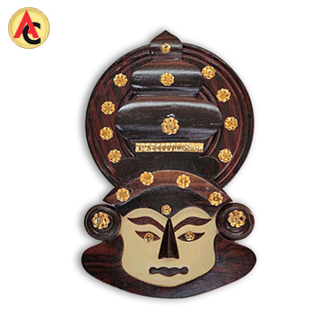 Kathakali dancer’s face depicted in wood
