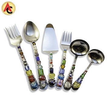 Ladle set decorated with wirework, glass beads