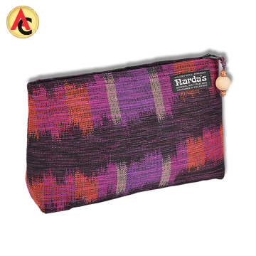 Clutch bag made of handwoven cotton-polyester fabric