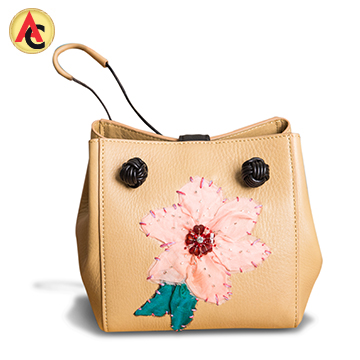 Leather bag with silk organza applique