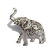 Elephant figurine features detailed engraving