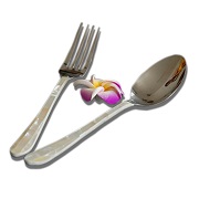 Flatware features handles covered with mother-of-pearl