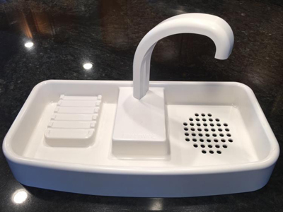 Toilet Tank Lid Doubles As Sink Saves Water