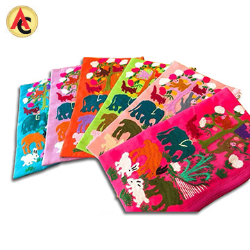 Fabric pouches feature handembroidered details