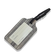 Luggage tag features handwoven textile
